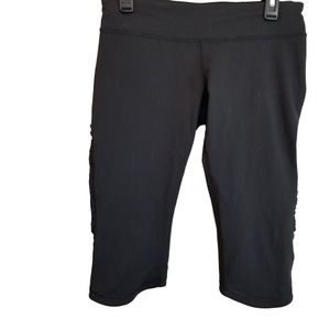 Lululemon Women's Run Fast Free Cropped Leggings Size 10 Black Pocket Ruffled